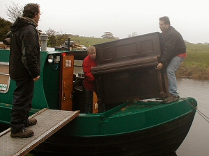 Photo - Moving an upright piano onto a canal barge at Salwick, near Preston on the Lancaster Canal. Everything is possible!!